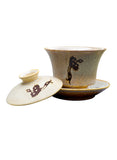 Ceramic cup with phoenix pattern