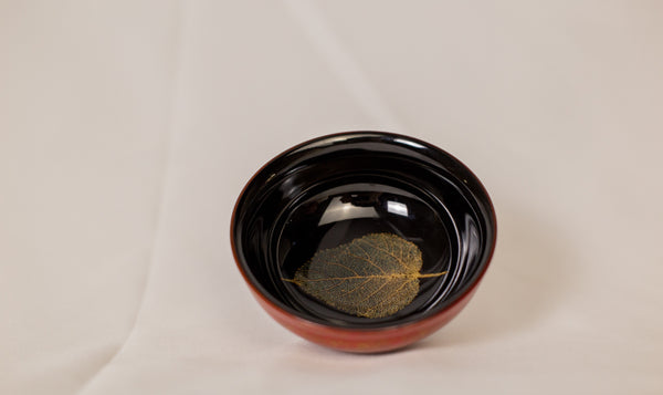 Traditional Chinese bowl with golden leaf inside